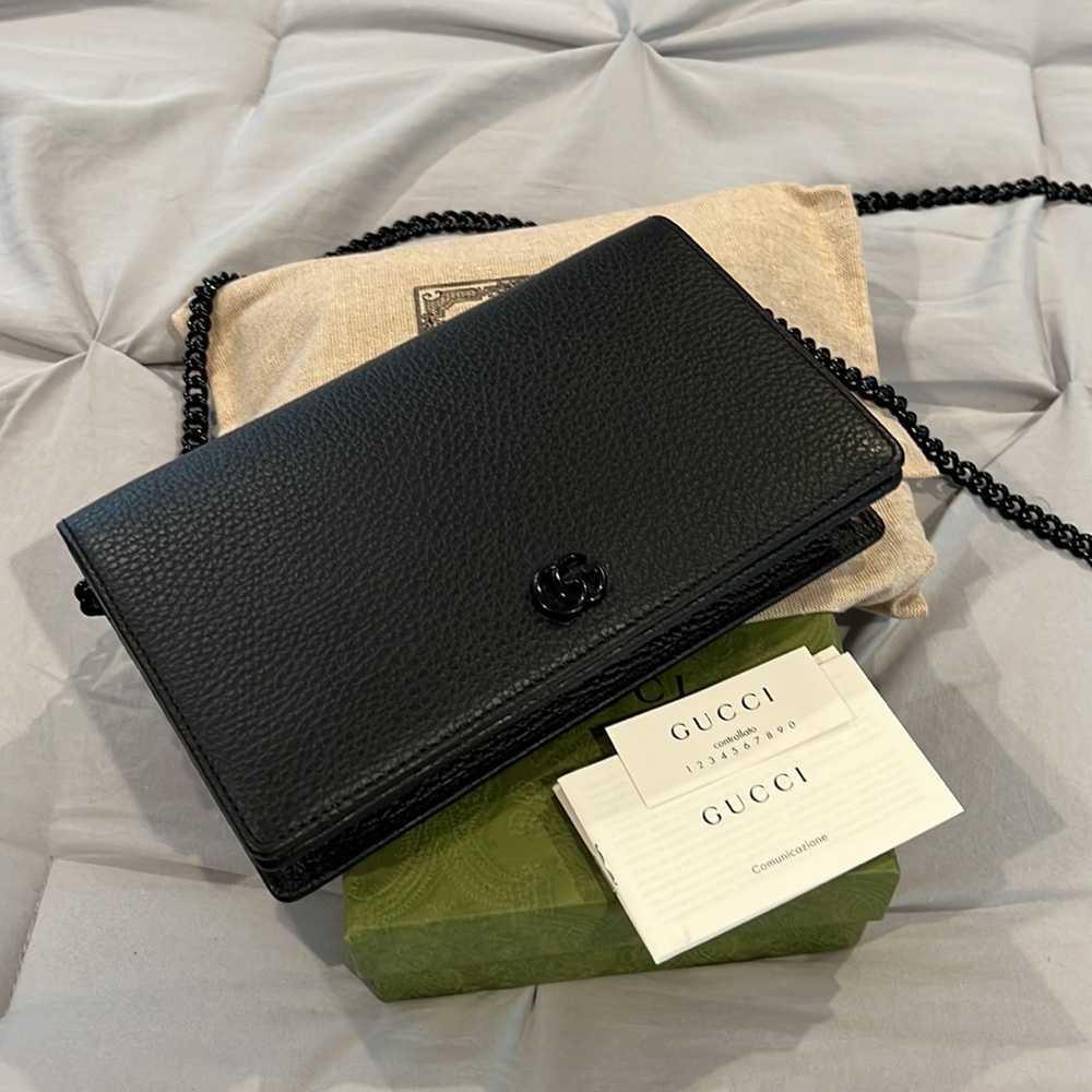 Leather Excellent Gucci WOC only worn 3 times. NO LOW BALL OFFERS or trades.
